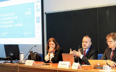 Speakers C. O. Rogate, T. Alfstad, and A. Thompkins at the 2018 The High-Level Meeting on Modelling Tools for Sustainable Development Policies in Trieste