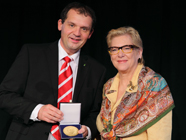 Mr. Carsten L. Wilke, President of the German Forestry Association presents the Fernow Award to Ms. Jan McAlpine, Director of the United Nations Forum on Forests Secretariat