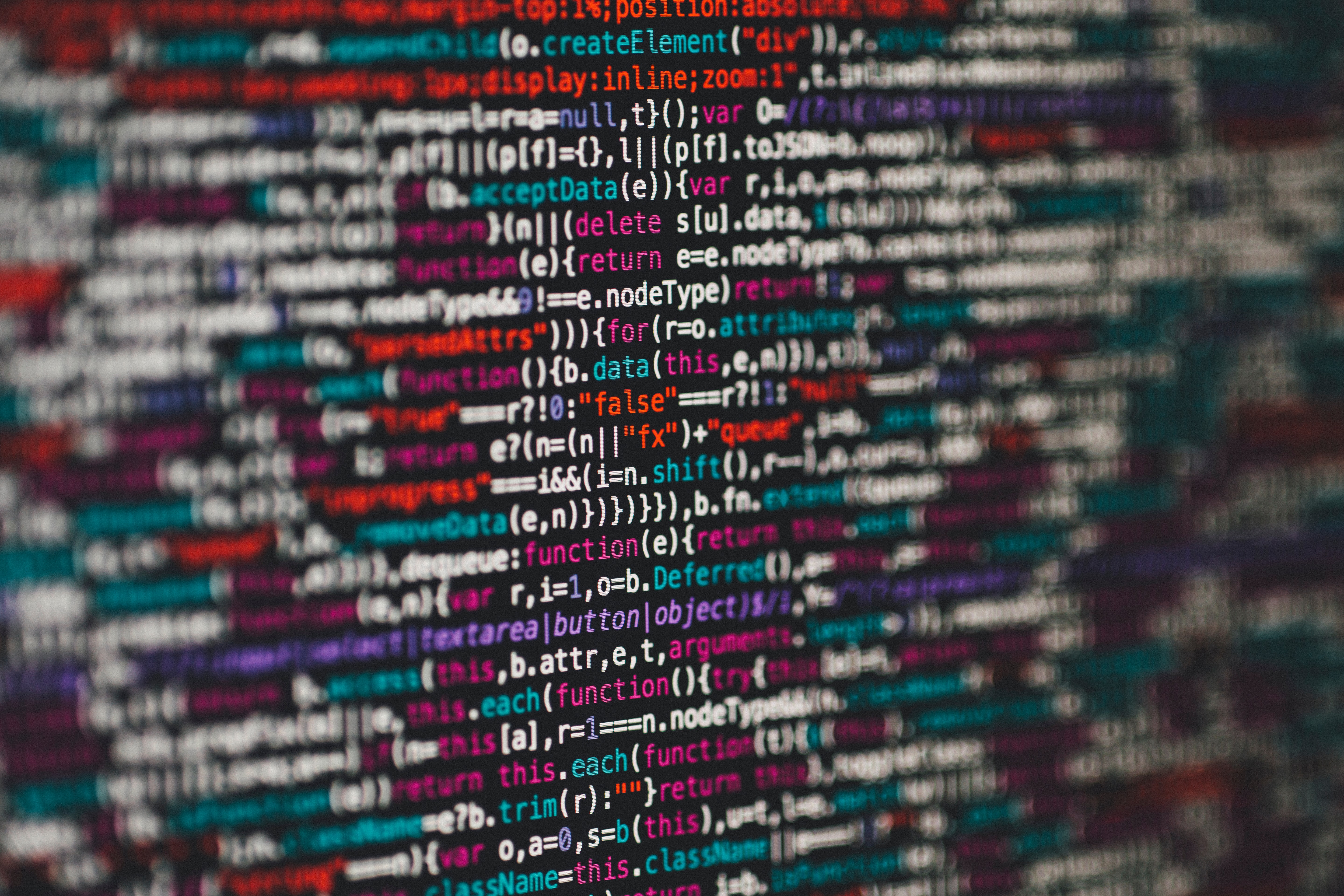Photo of lines of colorful digital code.