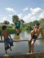 National Tapajos Forest Young Residents Play on Bridge (UN Photo/Eskinder Debebe)