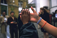 Two children slap hands in a 'high-five' in support of 'Say Yes for Children', following the international launch in London,UK -UNICEF/Justin Leighton