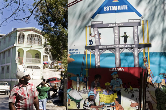 A mural in Port-au-Prince, part of a comprehensive public information campaign carried out by MINUSTAH graphically shows the role that rule of law plays in developing stability, 2009.  UN Photo by Marco Dormino