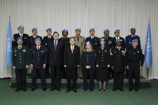 SG Ban Ki-moon and USG for Peacekeeping Operations Alain Le Roy join UN Police Advisor Anne-Marie Orler at a meeting of the Heads of Police Components of UN peace operations, 2011. UN Photo/Paulo Filgueiras
