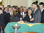 Secretary-General Kofi Annan consoles family of Sergio Vieira de Mello, Special Representative in Iraq.