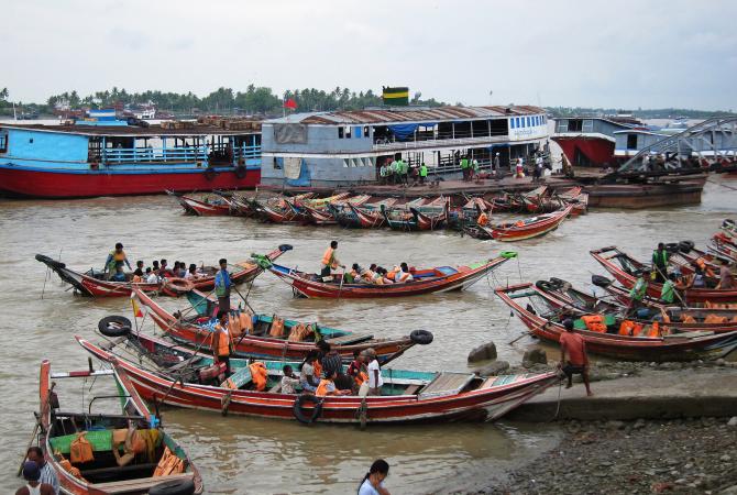 Boats on shoreline in Myanmar.