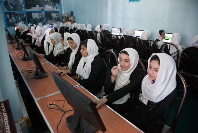 A computer class is conducted at the high school in Herat, Afghanistan.