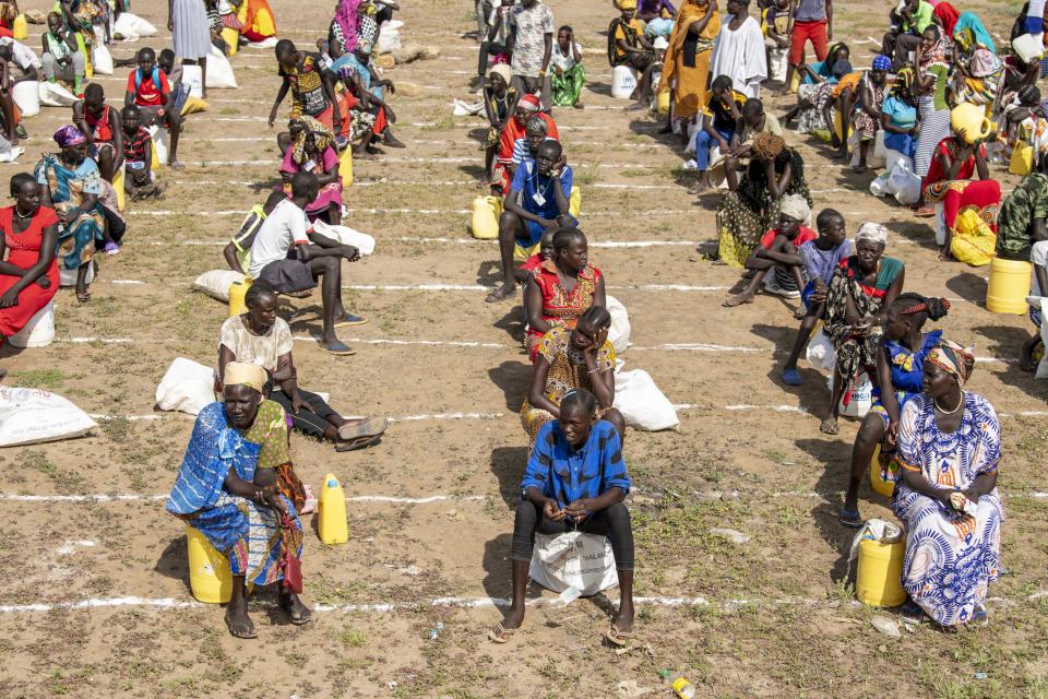 South Sudanese refugees practice social distancing South Sudanese refugees practice social distancing