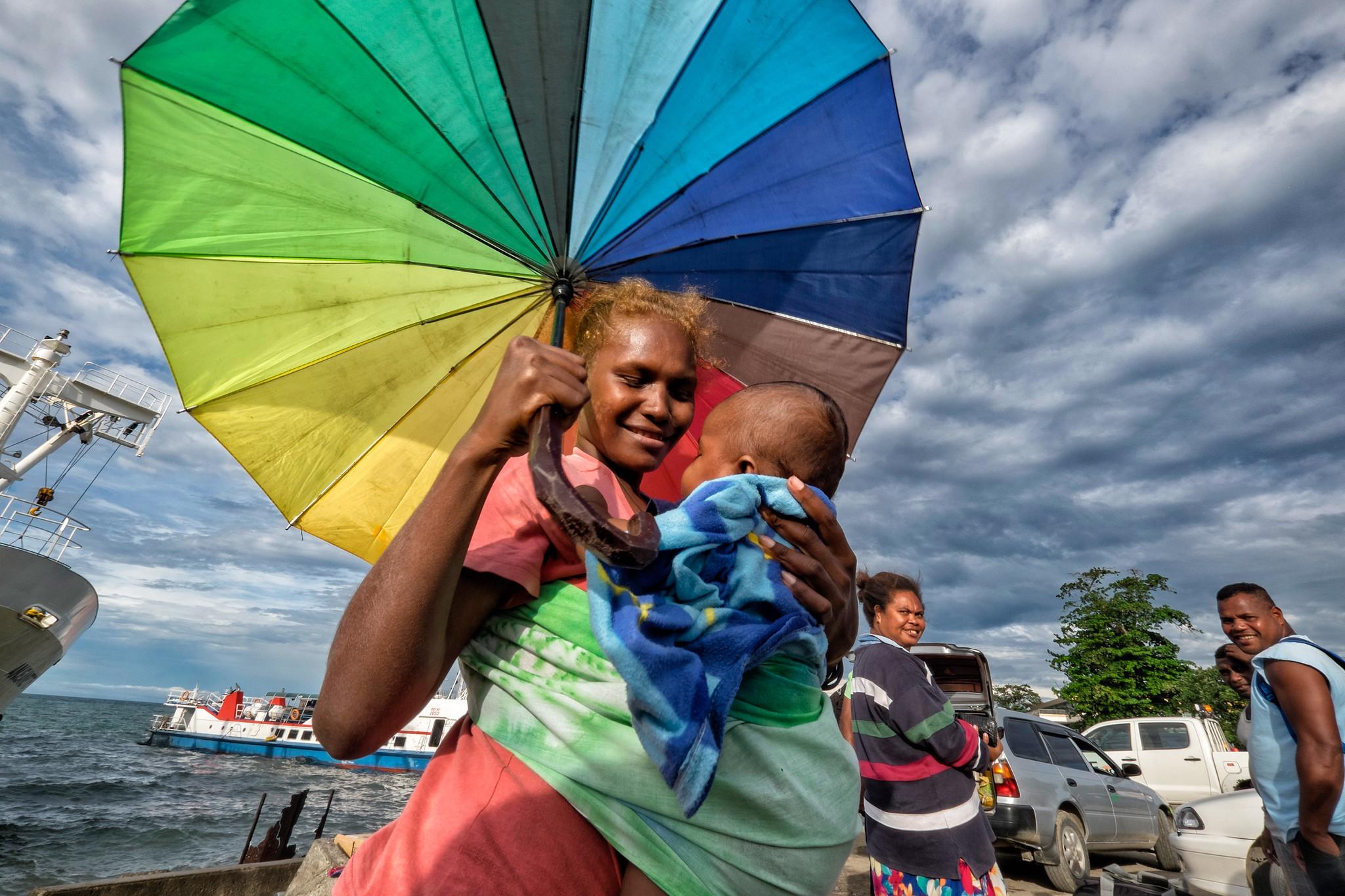 People arriving from an inter island boat trip at the Port of Honiara (Solomon Islands)