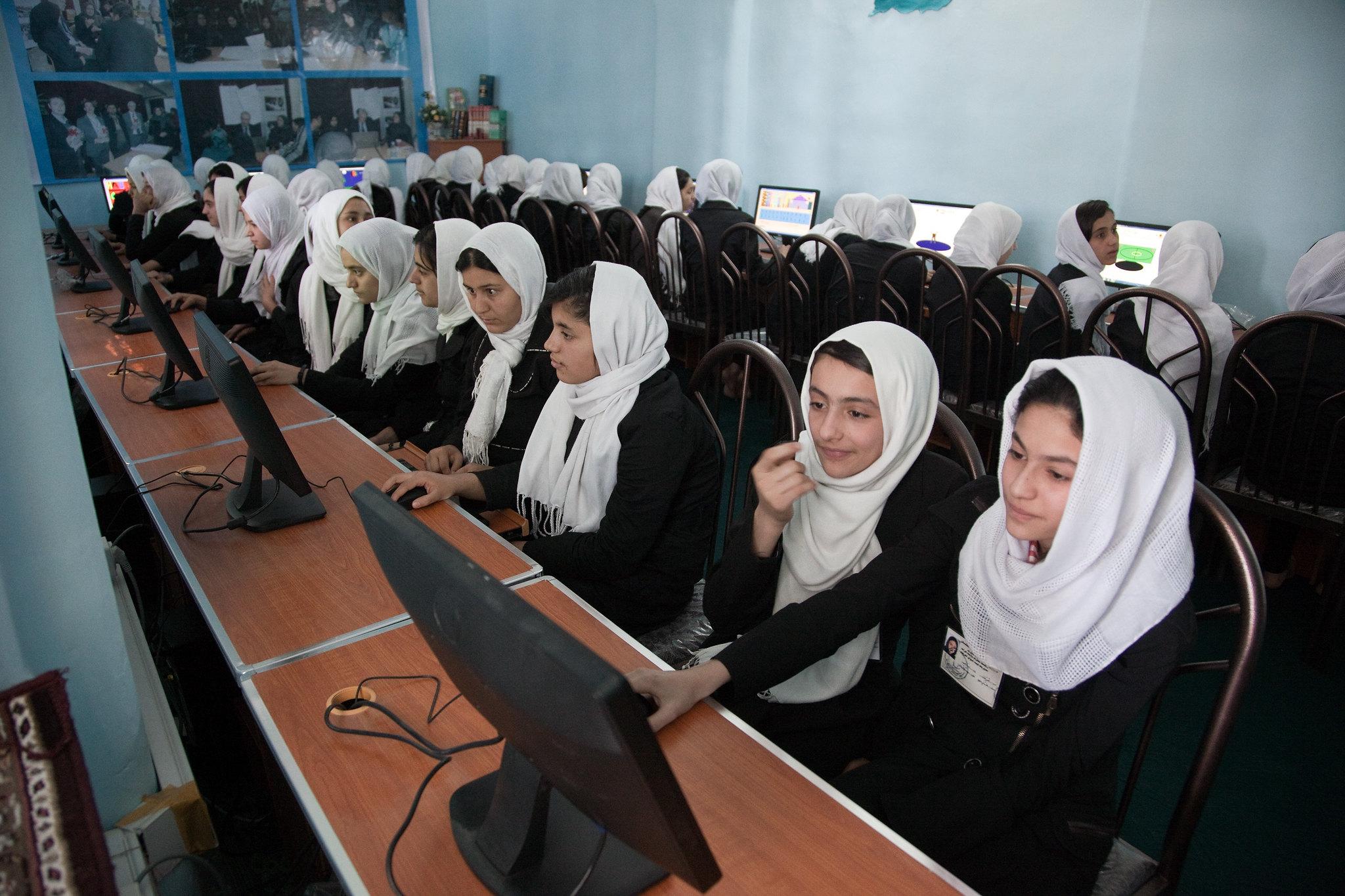 A computer class is conducted at the high school in Herat, Afghanistan.
