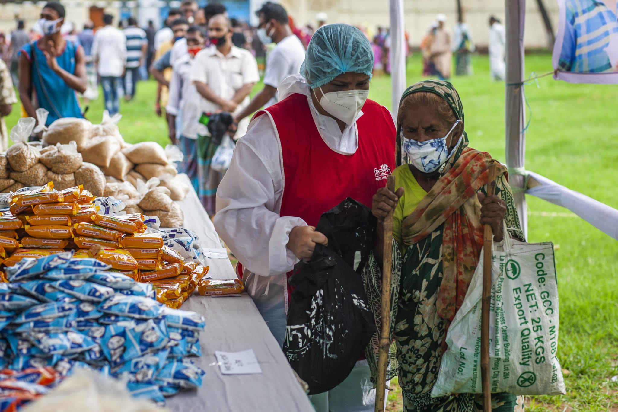 The picture of senior volunteer working at the frontline of the Covid-19 outbreak in Bangladesh. 
