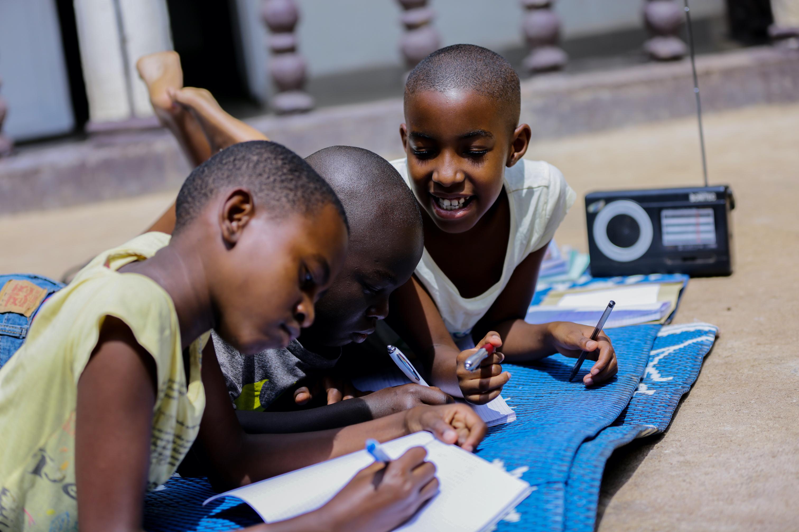 Rwanda’s students listen to radio lessons at home while their schools are closed due to COVID-19.