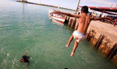 Children enjoy swimming in Nuku'alofa, capital of Tonga. Photo: Asian Development Bank