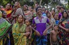 Residents visit the school in Kashadaha village, Bangladesh.