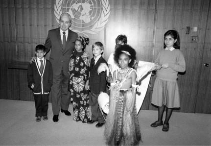 20 November 1989 - Group of children meeting the Secretary-General Javier Perez De Cuellar after the General Assembly adopts the Convention on the Rights of the Child. Photo credit: UN Photo/Milton Grant.