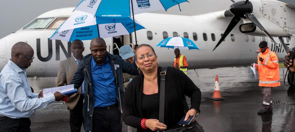 Shireen Dodson coming out of a UN plane