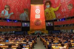 A wide view of a projection in the General Assembly Hall as the Secretary-General speaks
