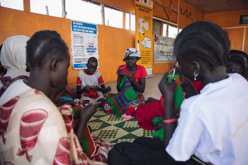 OCHA/Sarah Waiswa girls working on handicrafts