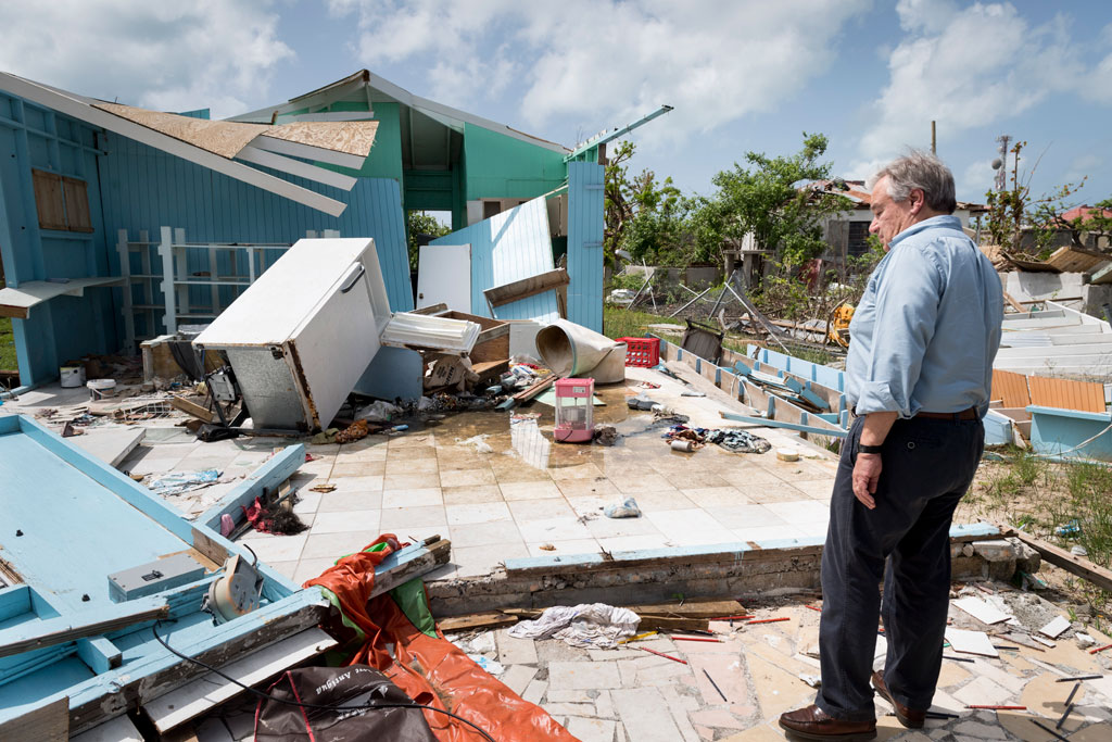 Secretary-General António Guterres walks through Codrington town in Barbuda to see firsthand the devastation left behind by Hurricane Irma. UN Photo/Rick Bajornas 