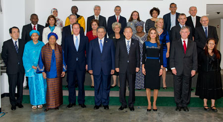 Secretary-General Ban Ki-moon in a group photo with members of his High-Level Panel on the Post-2015 Development Agenda