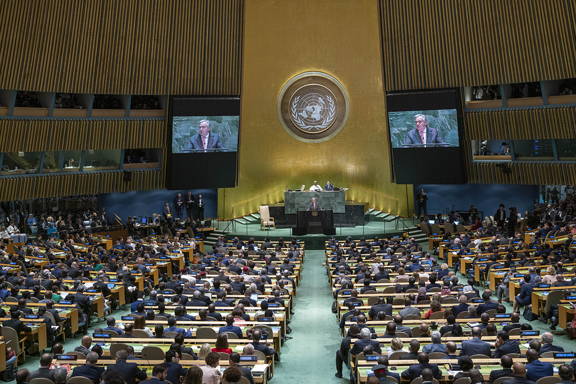 Secretary-General António Guterres (on screens and at podium) addresses the opening of the general debate of the seventy-fourth session of the General Assembly.