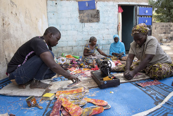 Cameroonians who have been displaced by Boko Haram attacks have been trained to make leather goods in order to generate income. (January 2019)