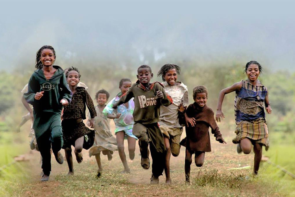 smiling children running