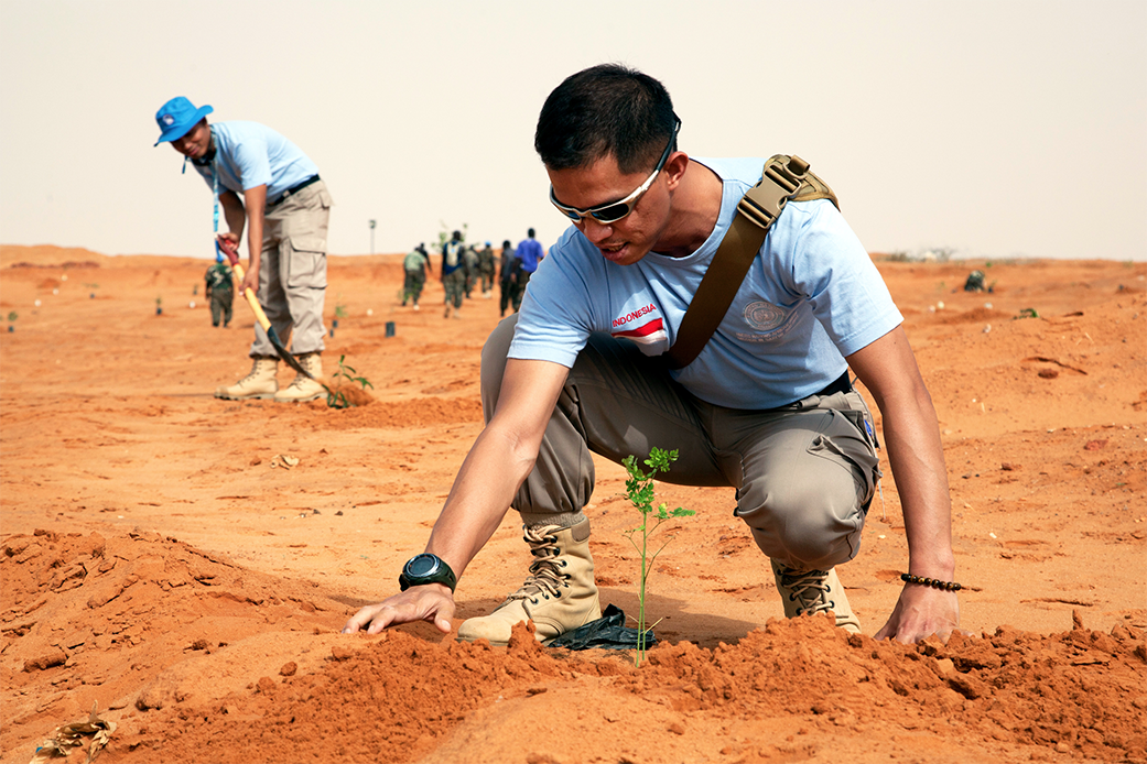 policemen planting trees