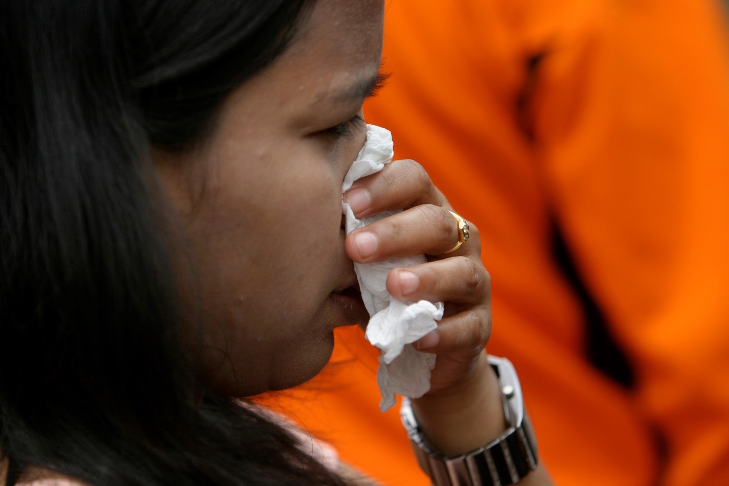 woman with tissue