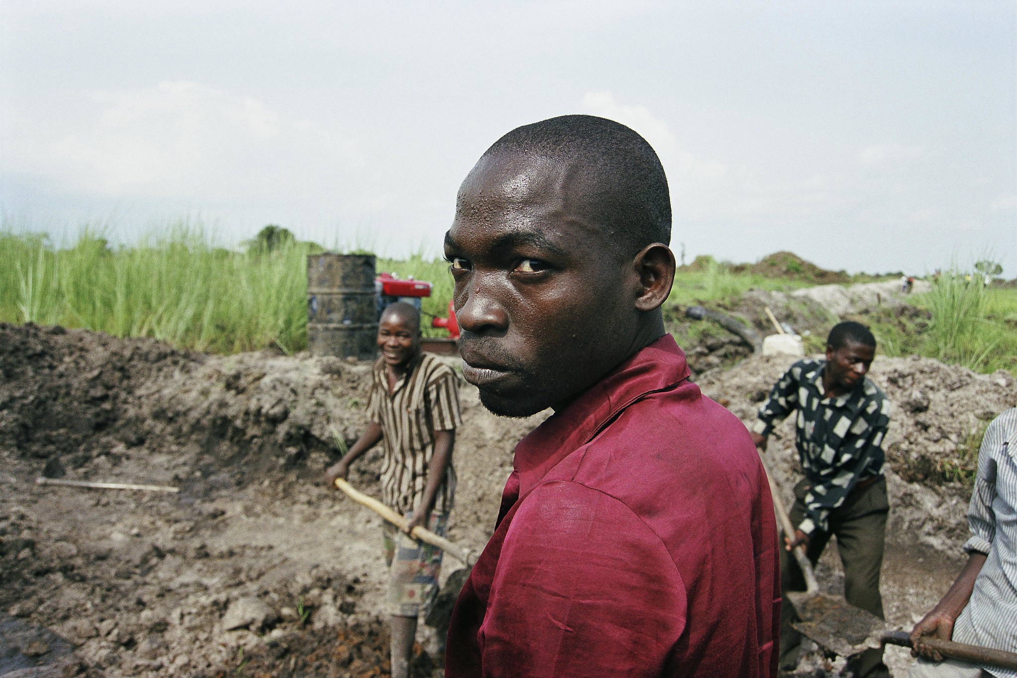 men working with shovels