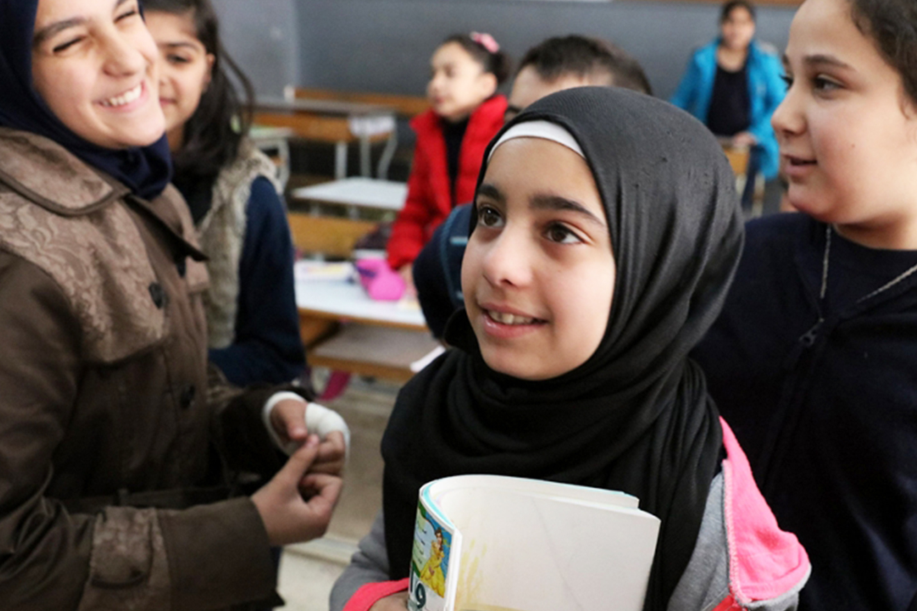 Students listen to their teacher while in class in Beirut, Lebanon. 