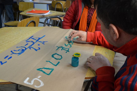 inmate learning handpainting poster