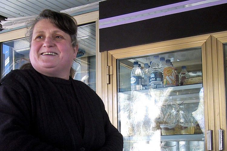 A baker in Elbasan (city near Tirana) sells a typical dessert for a summer day. 