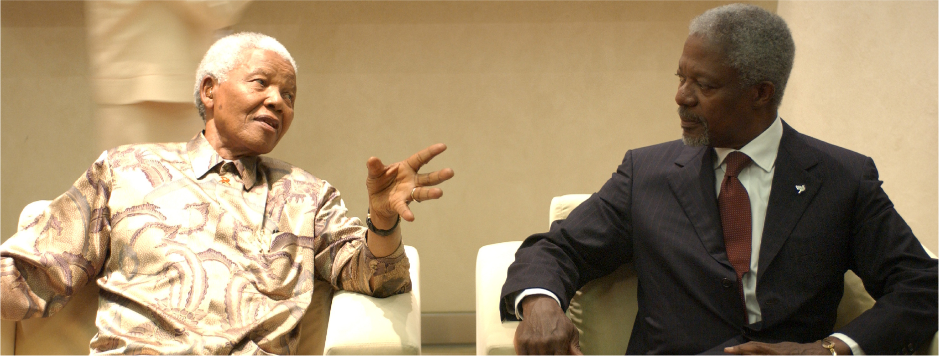 UN Secretary-General Kofi Annan (at right) in a discussion with Nelson Mandela during the World Summit.