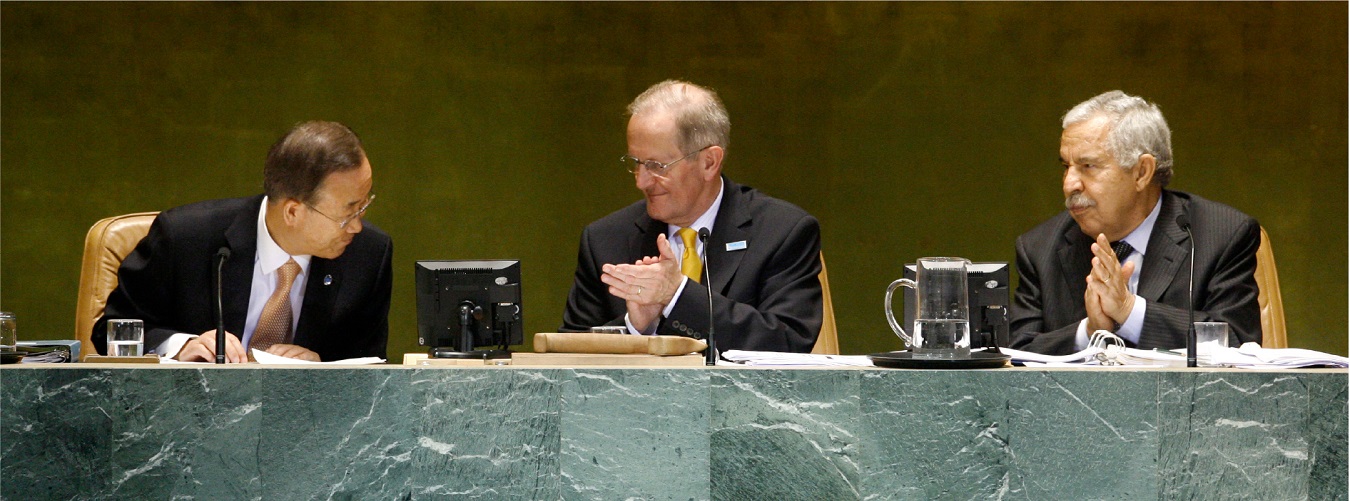 Secretary-General Ban Ki-moon, Joseph Deiss and Abdussalam Treki applaud the adoption of the follow-up resolution from the General Assembly podium.