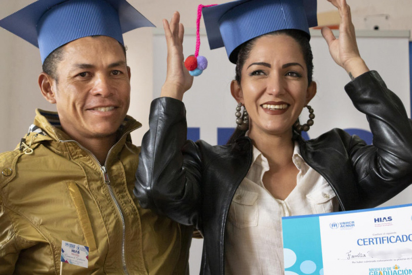 Venezuelans Osmar and Valeria at the ceremony marking the end of their participation in a training program aimed at giving them the skills to provide for themselves in their new home, Ecuador.  