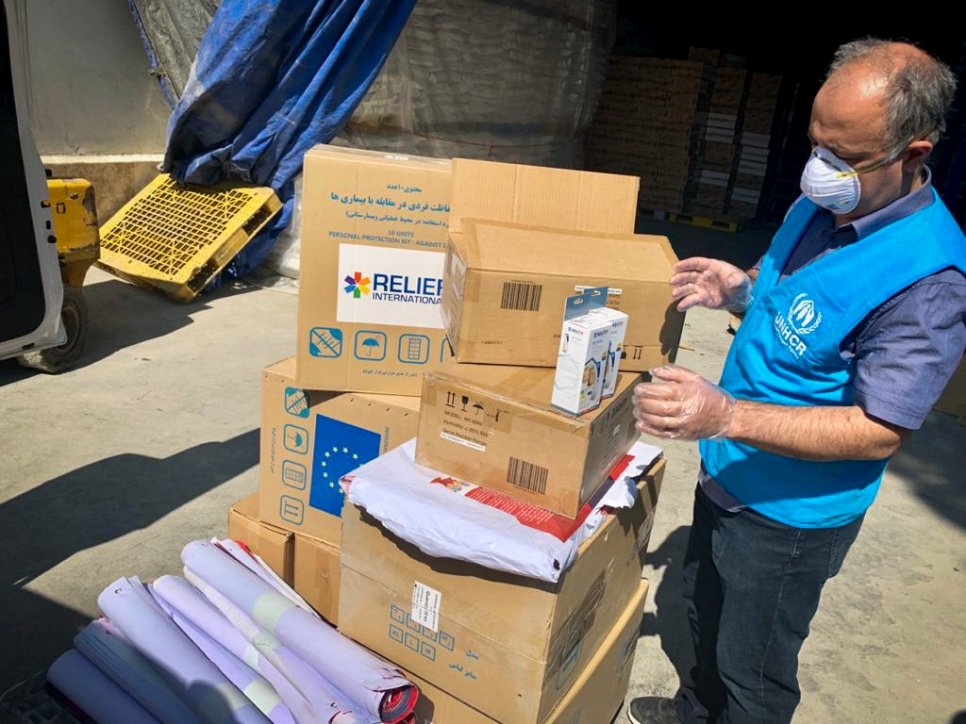 man unloading boxes