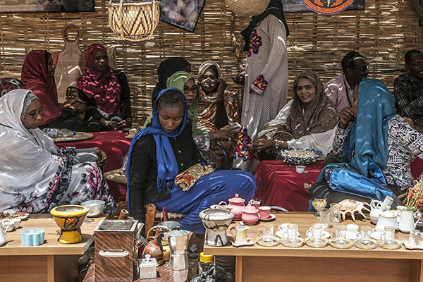 Women at a bazaar