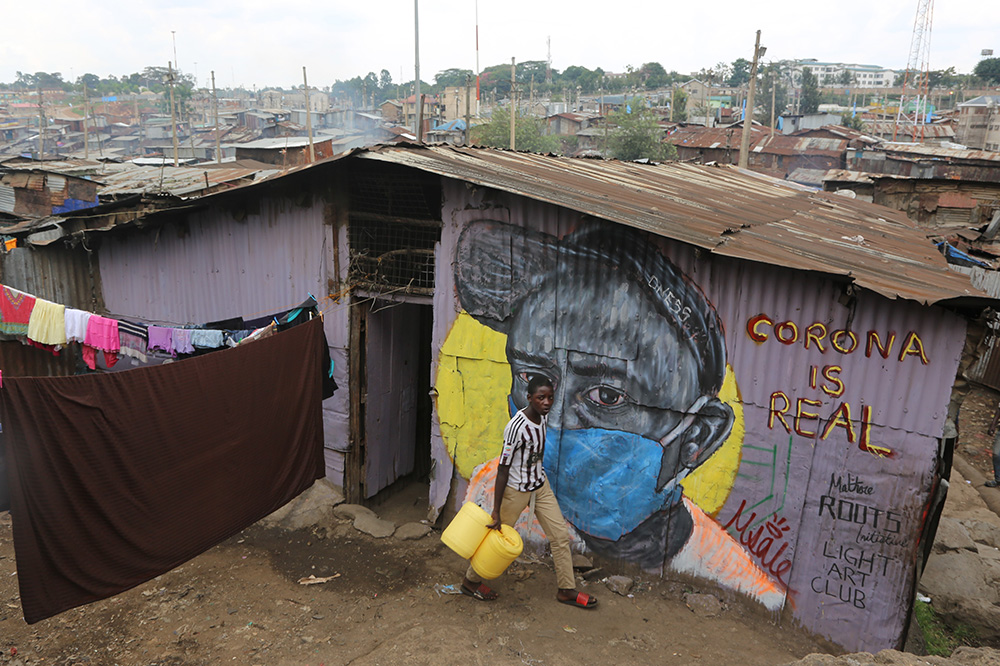A mural in Nairobi’s informal settlement of Mathare creating awareness of the importance of wearing masks to combat COVID-19
