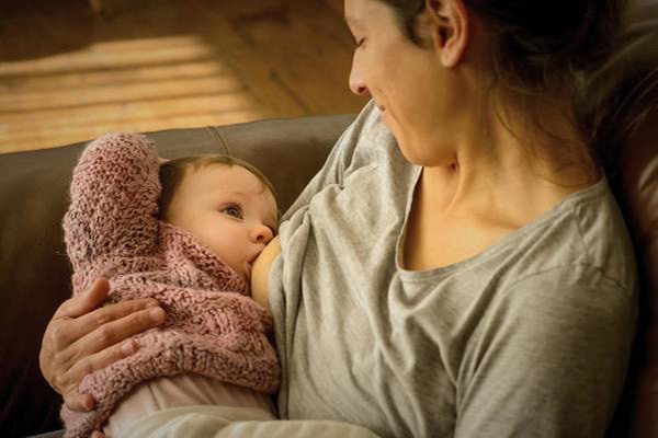 Mother breastfeeding her baby