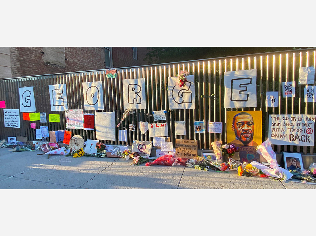 An impromptu memorial for George Floyd, who was killed after being restrained by police, has been set up in Harlem, New York City. Photo by Hazel Plunkett