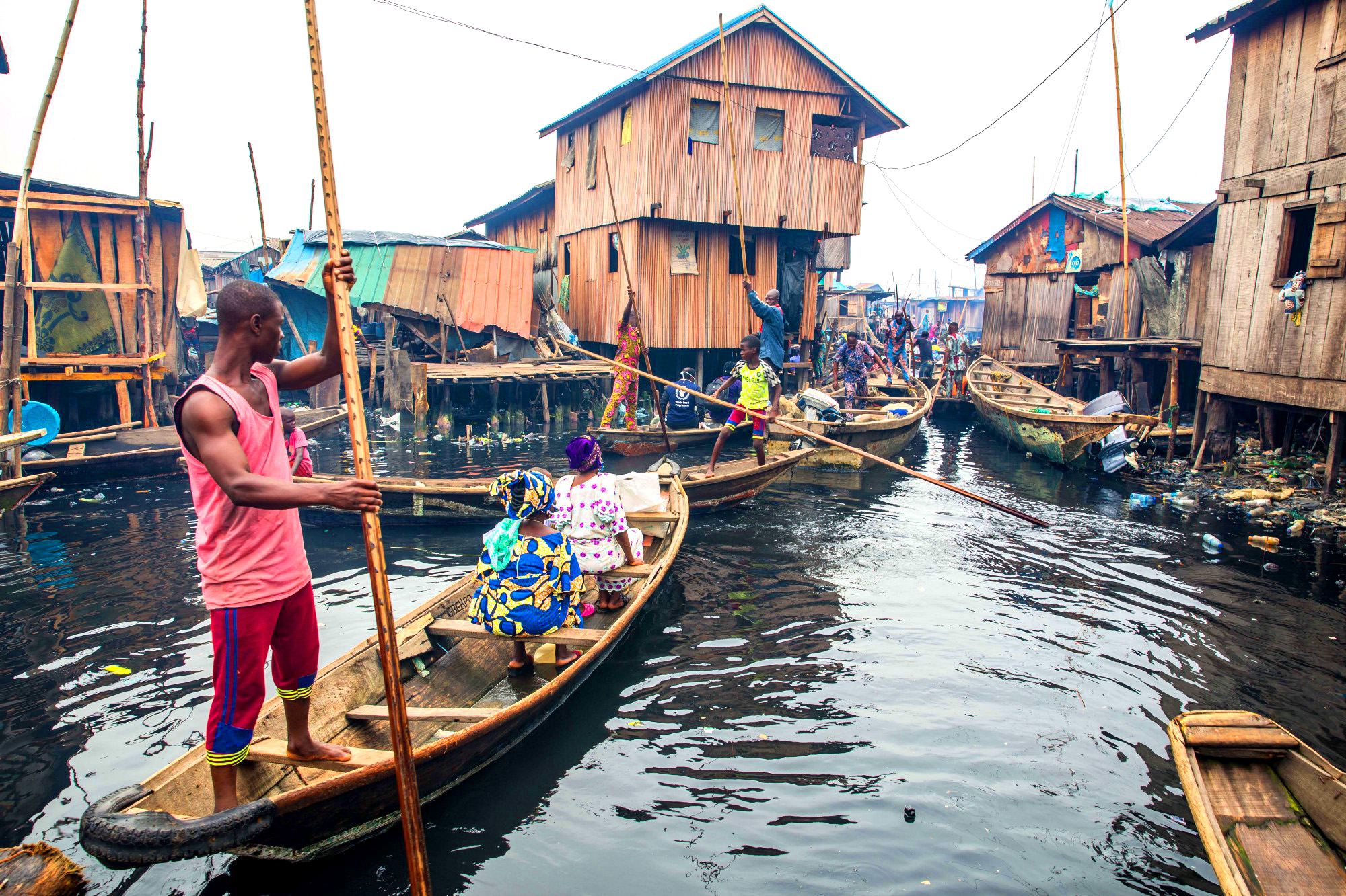 Canoes bumping into each other in narrow waterways.