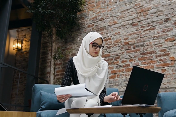 young woman with laptop