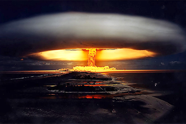 Nuclear mushroom cloud at night.