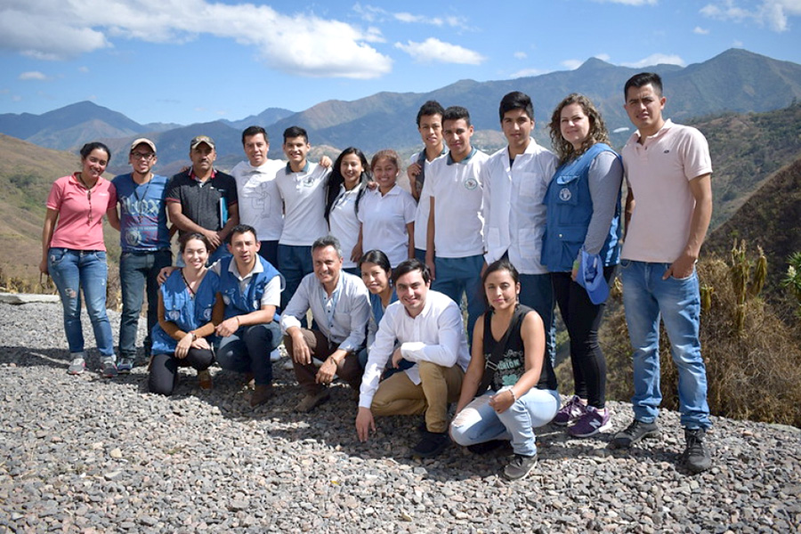 A group of people pose for a photo. 