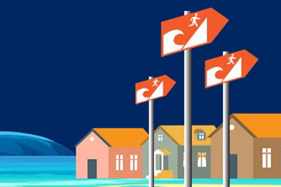 Illustration of tsunami evacuation signs near houses by the water.