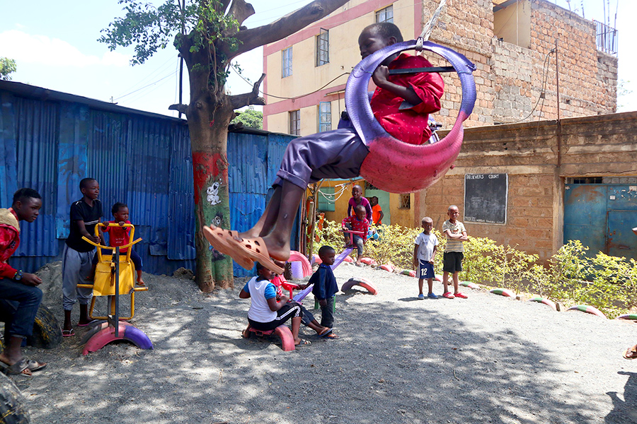 Children play in a community playground. 