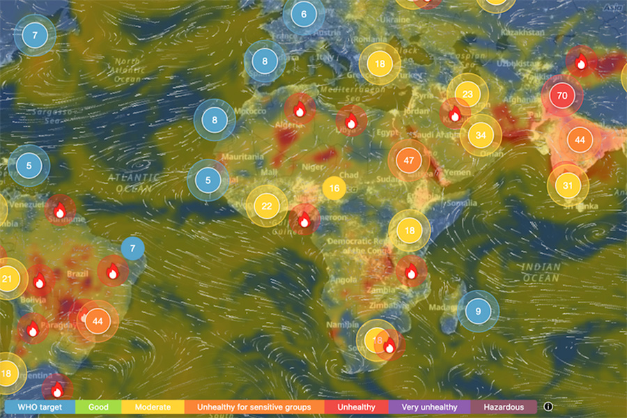 Map of the world with arrows representing wind and colours representing air quality.