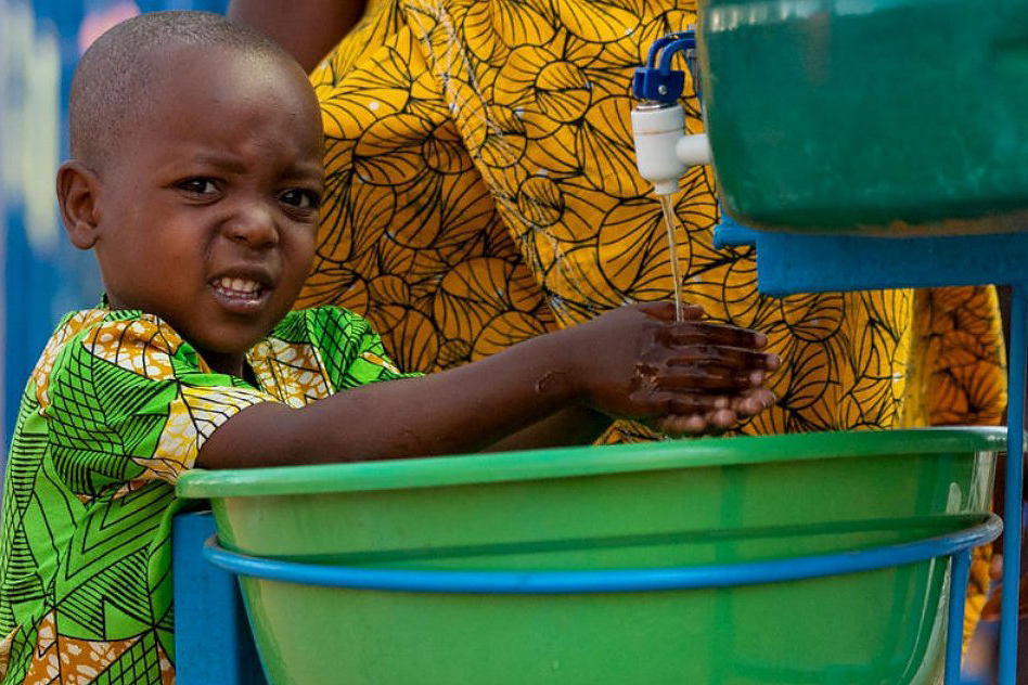 child washing its hands