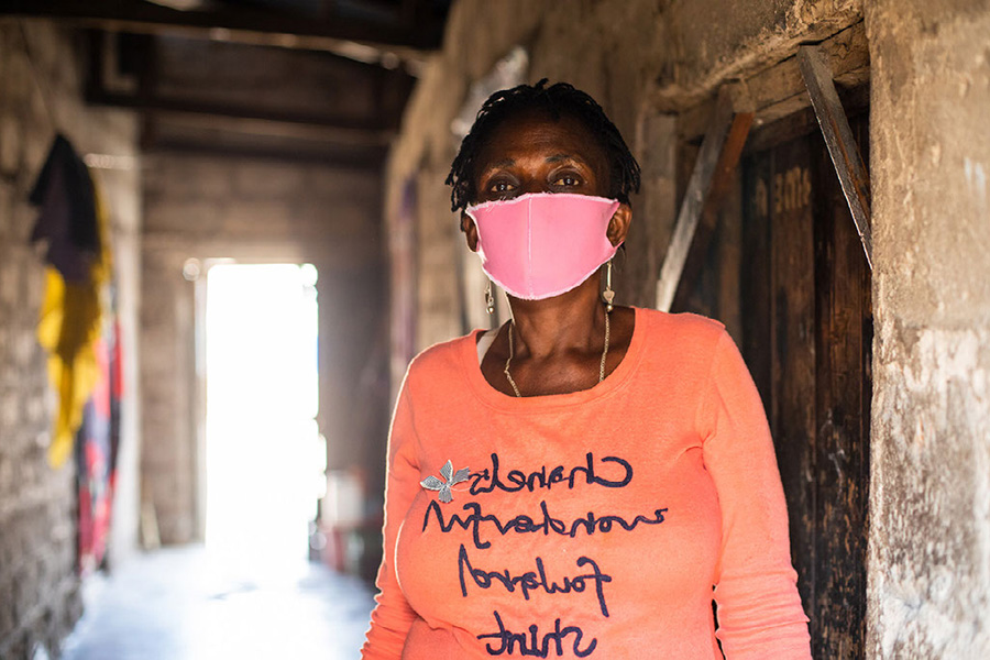 Portrait of a woman wearing a mask.