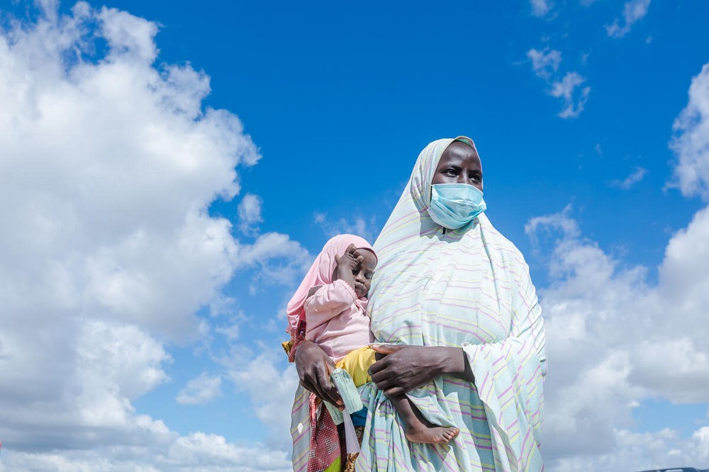 a woman with her baby